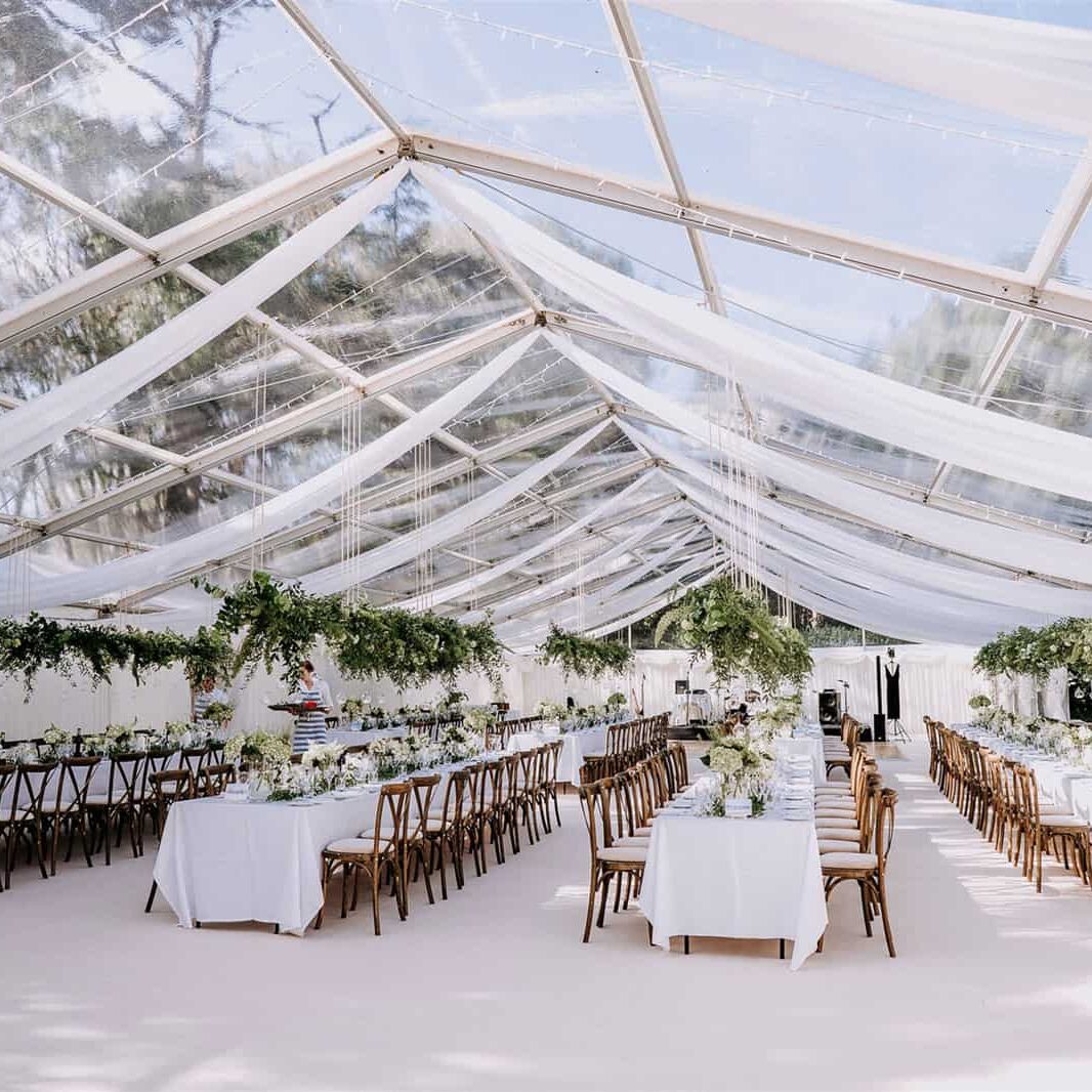 Elegant wedding marquee with pleated linings and florals