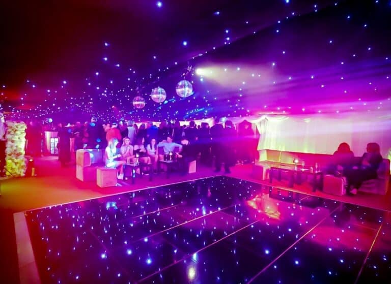 Festival or party marquee with dance floor and lighting